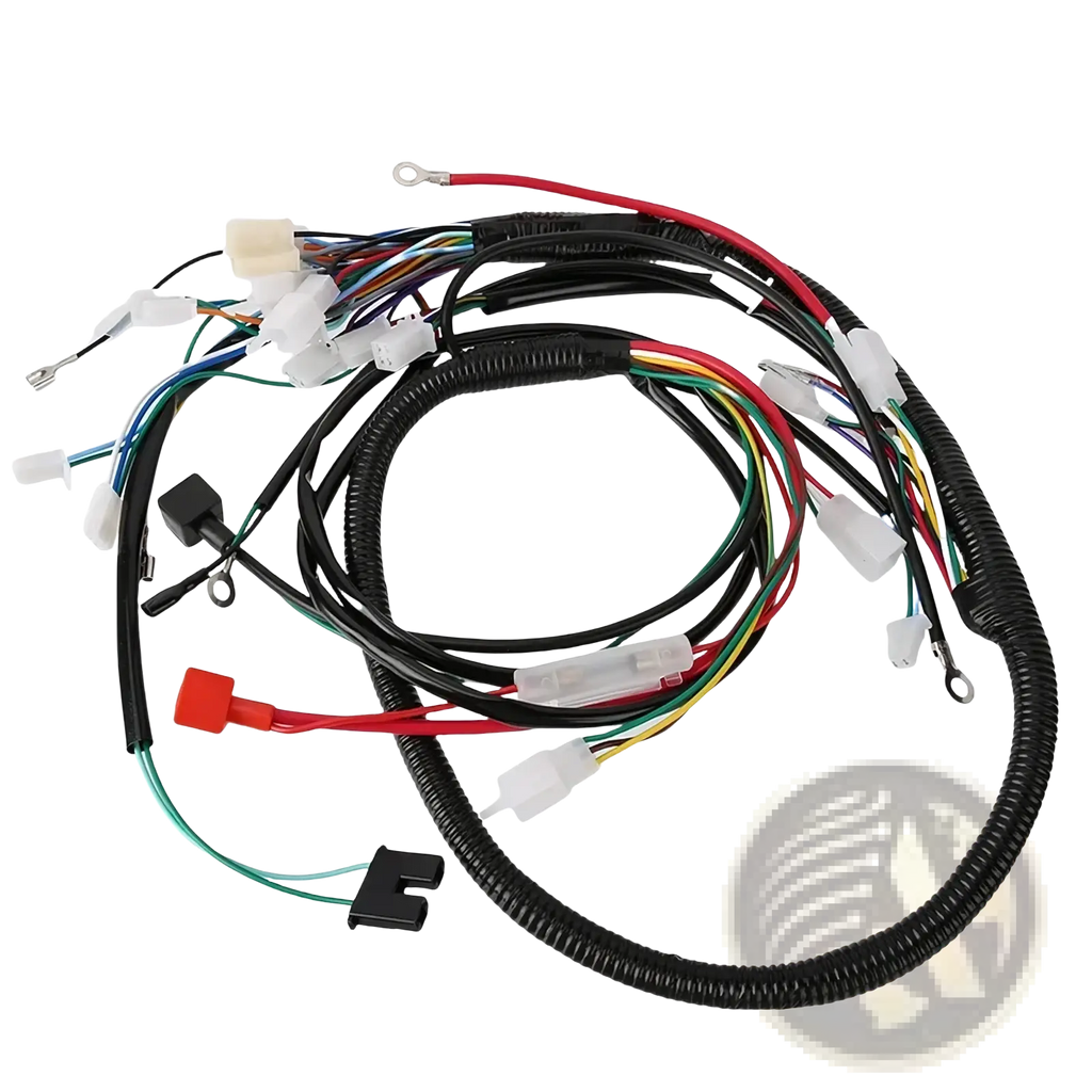 Black corrugated tubing houses multi-colored wires with plastic connectors in atv wiring harness for offroad go kart assembly