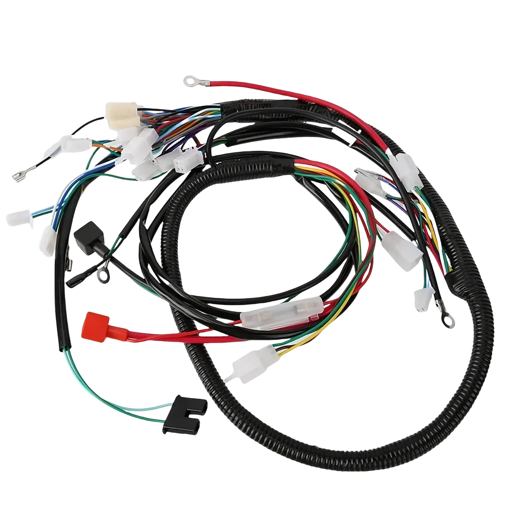 Black corrugated tubing houses multi-colored wires with plastic connectors in atv wiring harness for offroad go kart assembly
