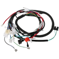 Coiled black atv wiring harness with multiple colored wires and connectors for offroad go kart assembly
