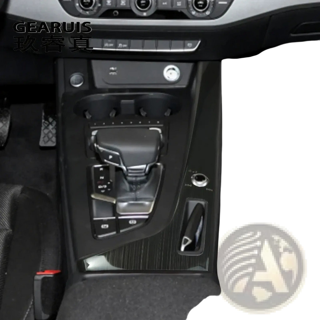 Black textured audi a4 b9 a5 center console cover with integrated cup holders and gear shift area trim panel