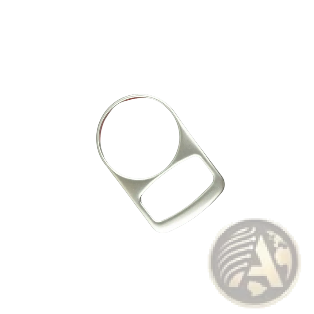 Silver metal can opener with circular top and rectangular base shown with audi q3 2012-2016 interior trim decoration set