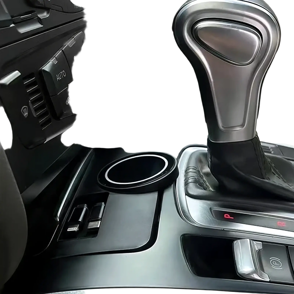Black circular Audi Q5 A4l magnetic wireless charger car cup holder with silver rim and matte finish