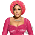 Vibrant pink auto gele headtie with gold embroidered patterns for Nigerian wedding headwrap use