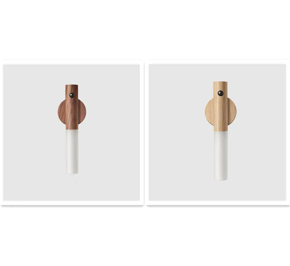 Minimalist magnetic wooden motion sensor LED night light with warm wooden circular base and white cylindrical lampshade