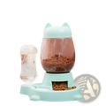 Light blue cat-shaped automatic pet feeder with transparent food compartment and matching gravity water dispenser station