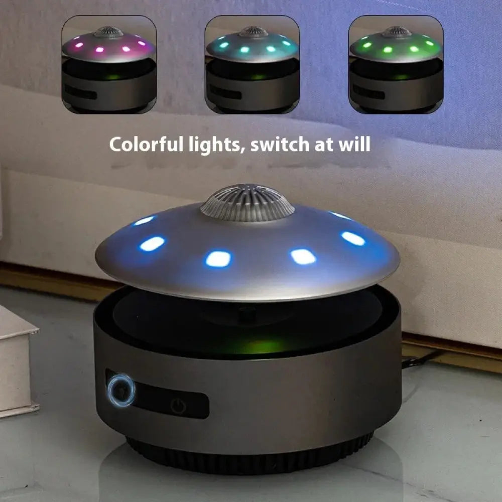 Silver UFO-shaped LED lamp with colorful switchable lights for floating UFO magnetic levitation Bluetooth speaker