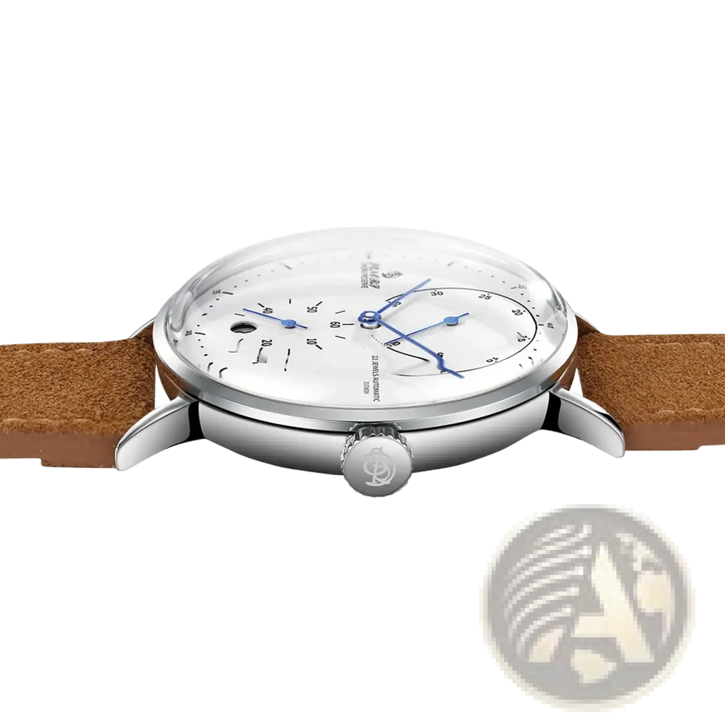 A sleek silver automatic mechanical leather watch for men with a white dial, blue hands, stainless steel case, and tan strap