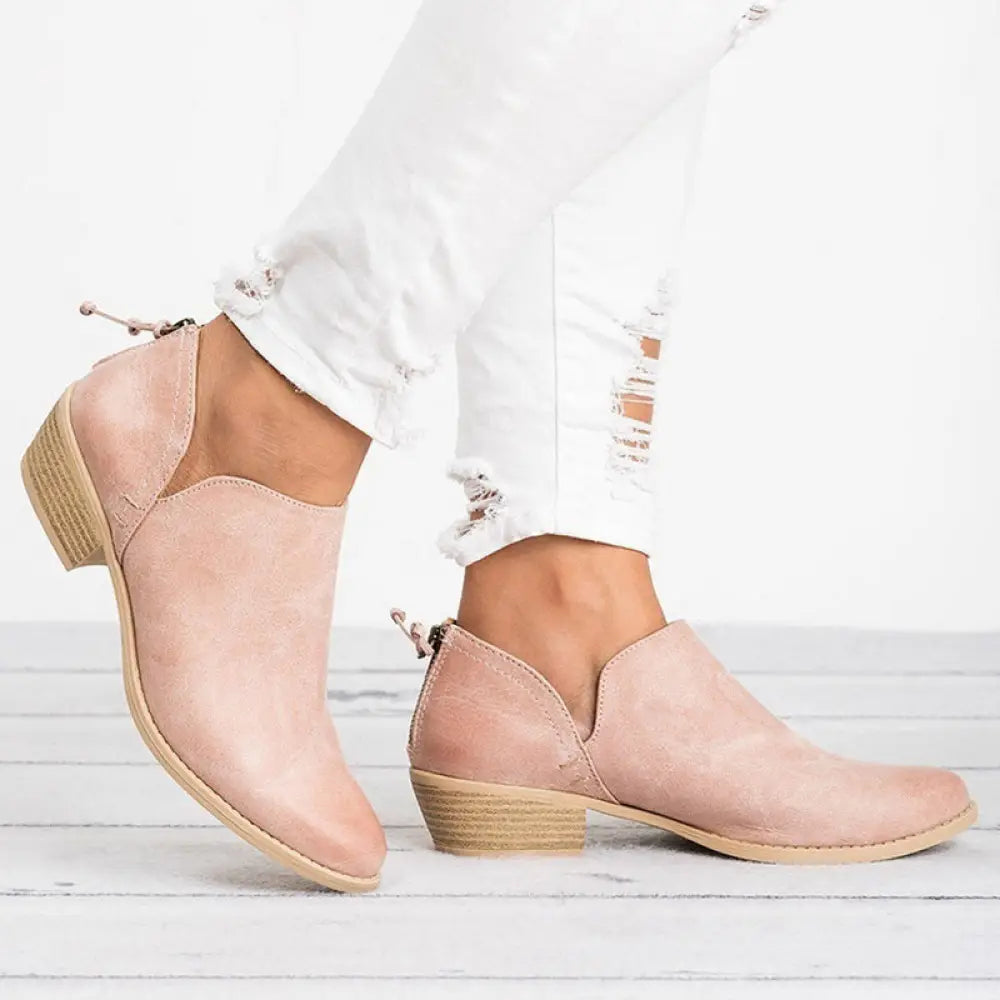 Pink suede retro ankle boots with low block heel and zipper closure perfect for stylish casual wear