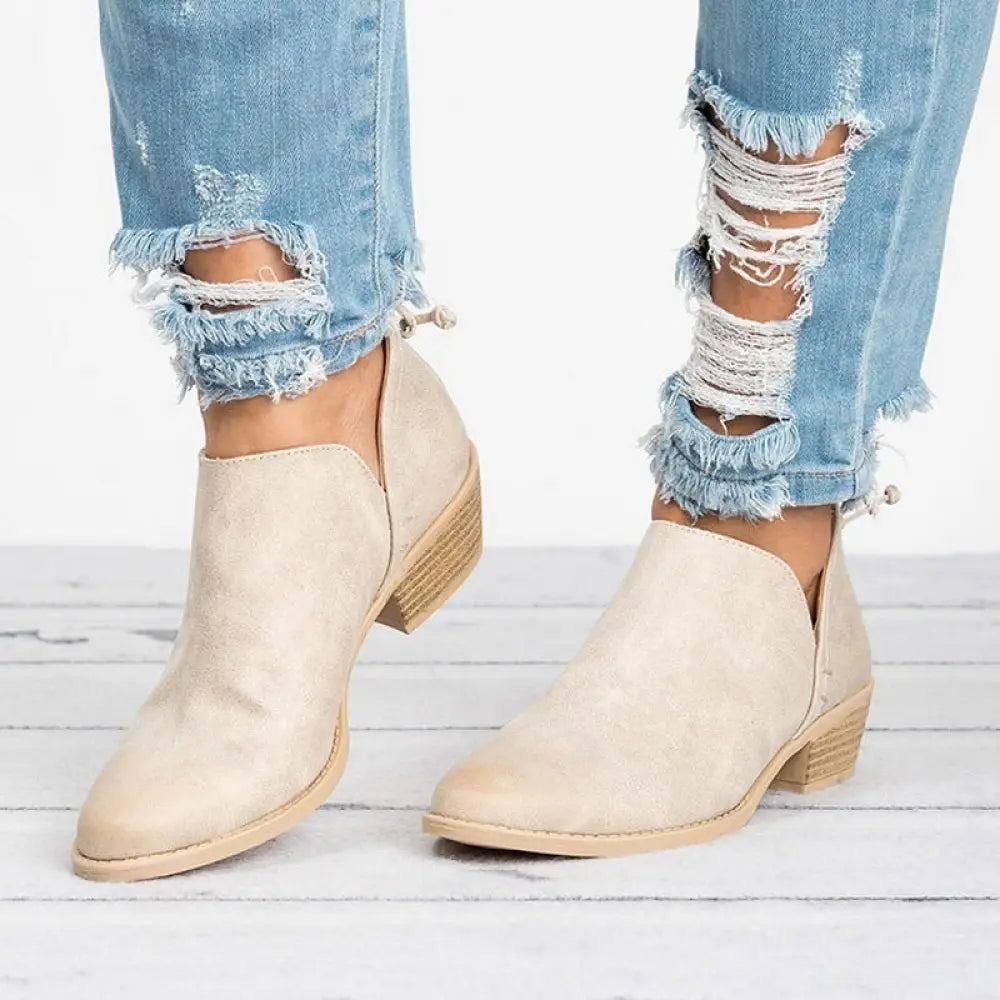 Beige suede ankle boots with a low block heel and pointed toe from the Retro Suede collection