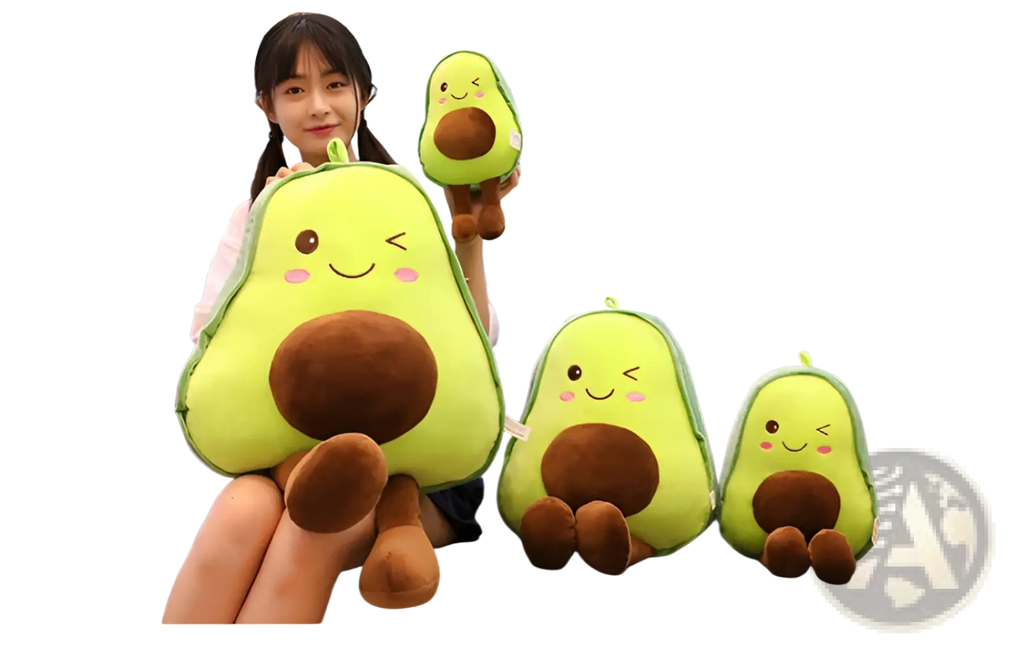 A soft plush avocado toy with green body brown pit and embroidered face ideal as a fruit pillow for kids