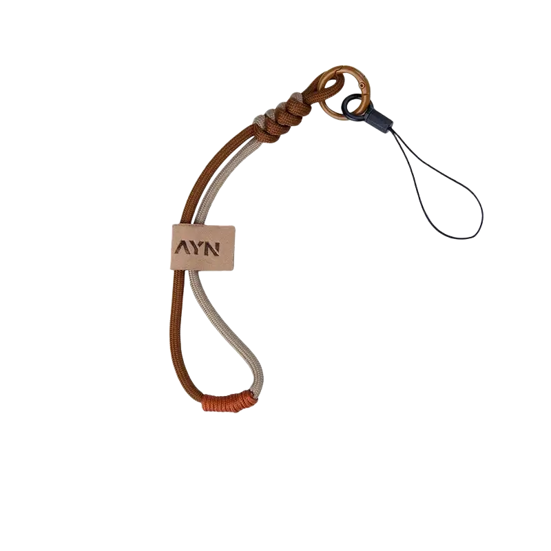 Ayn Thor brown and beige braided cord lanyard with brass metal ring and black plastic clasp for accessories case