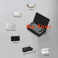 Black handheld gaming device with sleek design and dual circular controls in ayn thor protective case and grip kit
