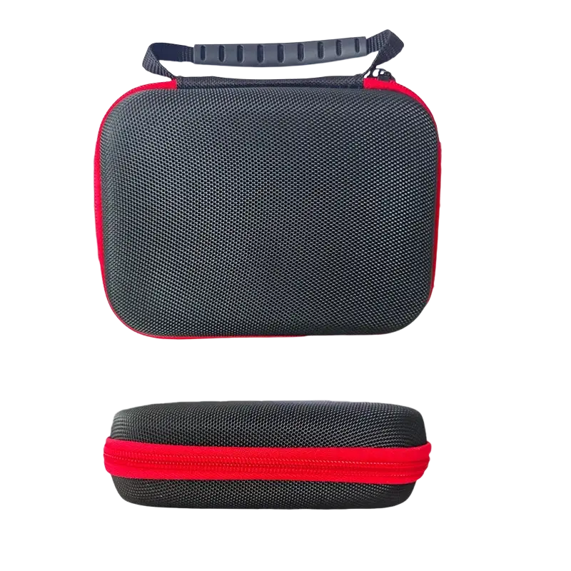 Ayn Thor protective hard shell case in black textured material with red zipper and handle for compact storage