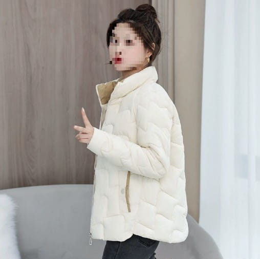 Cream-colored quilted cotton padded coat with a high collar and zipper closure Korean style jacket.