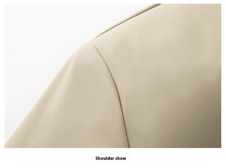 Beige suede shoulder of a men casual polo bomber jacket with tailored clean precise stitching.