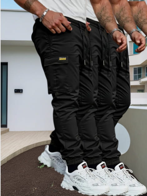 Men’s slim fit cropped black cargo joggers featuring multiple pockets and a drawstring waistband made from durable material.