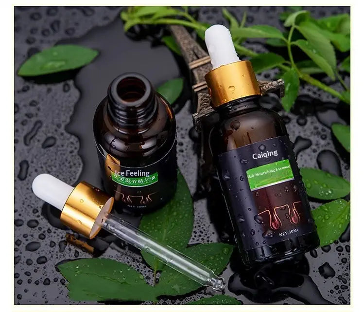Frascos cuentagotas de vidrio color marrón oscuro con tapas doradas y puntas de goma blancas, rotulados como caiqing, que contienen 30 ml de sérum para el crecimiento del cabello con aceites esenciales para la esencia nutritiva del cabello.
