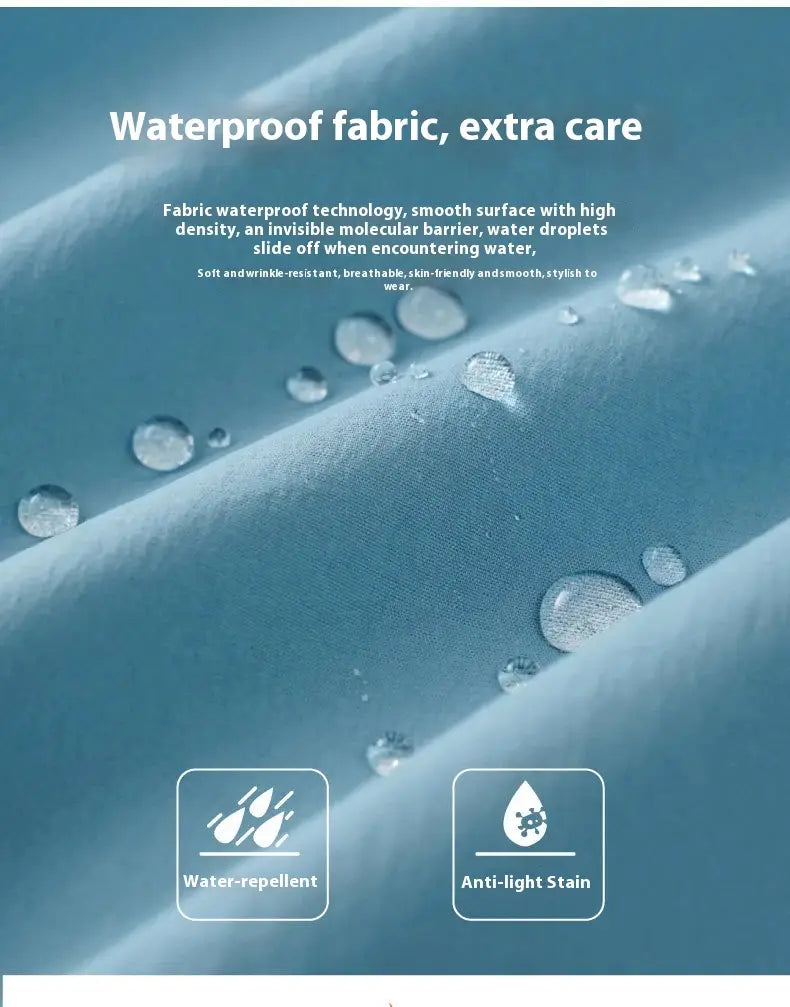 Tejido azul impermeable con superficie lisa de alta densidad que repele las gotas de agua y resiste las manchas leves en una chaqueta corta de plumón para mujer, abrigo acolchado abrigador para el invierno.