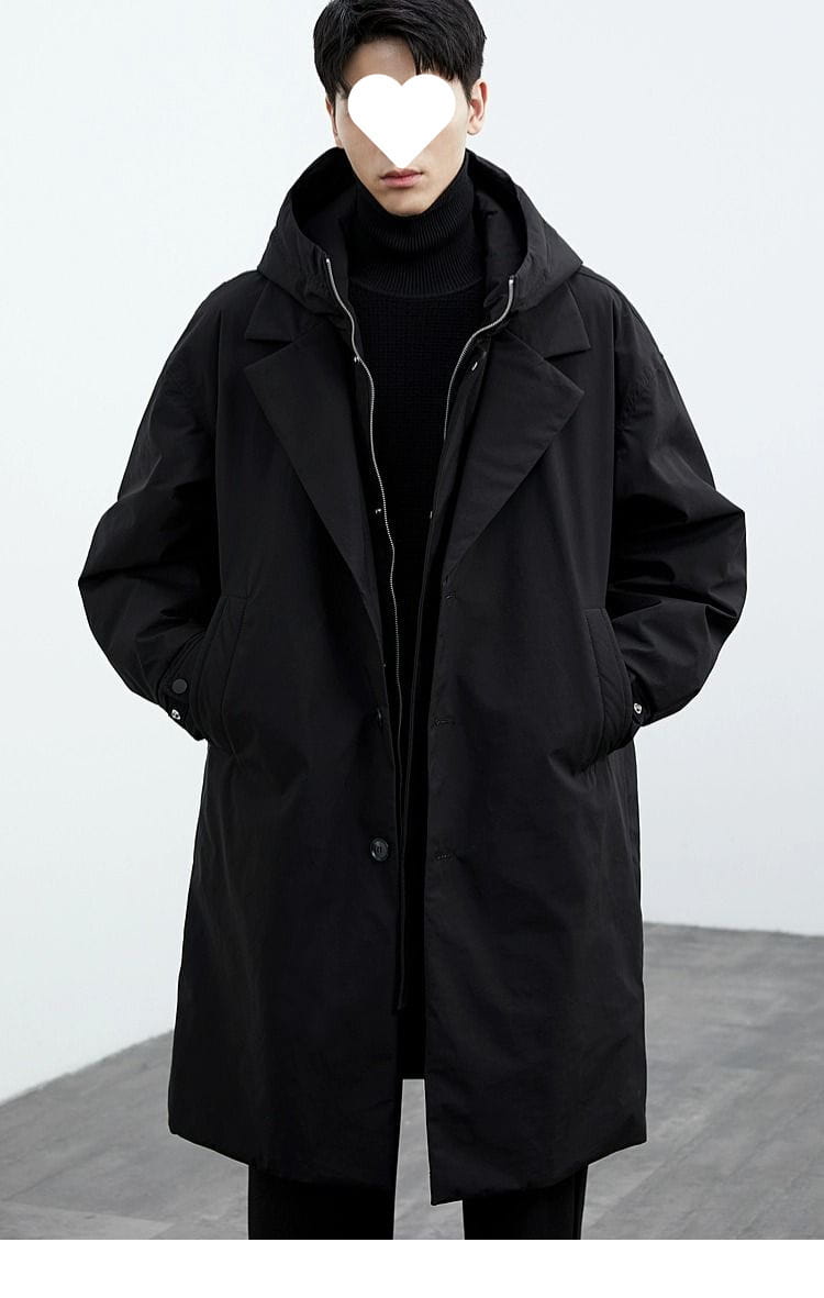 Black hooded trench coat with a sleek minimalist design and subtle silver zipper accents in a men hooded trench coat false two piece winter jacket.