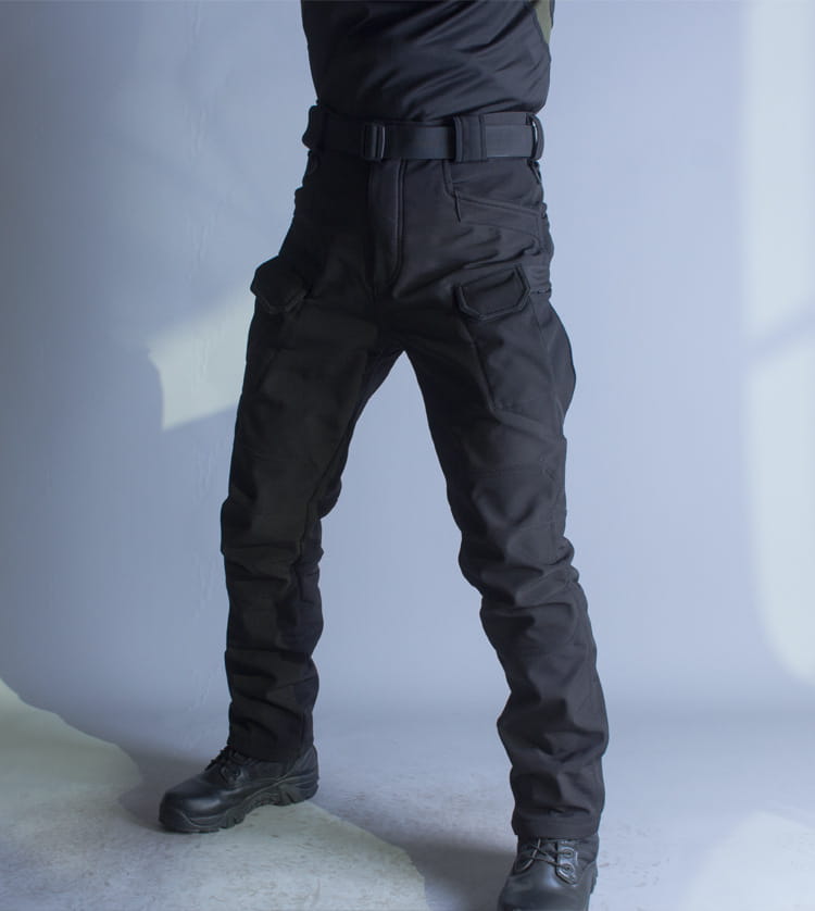 Ix7 mens fleece lined tactical pants in black featuring multiple cargo pockets and sturdy belt loop design for durable work use.