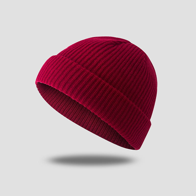 dark gray ribbed wool beanie hat featuring a rich crimson ribbed knit design with a folded cuff.