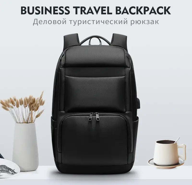 Multifunctional black nylon laptop backpack for business and travel with a sleek structured design and multiple zippered compartments.