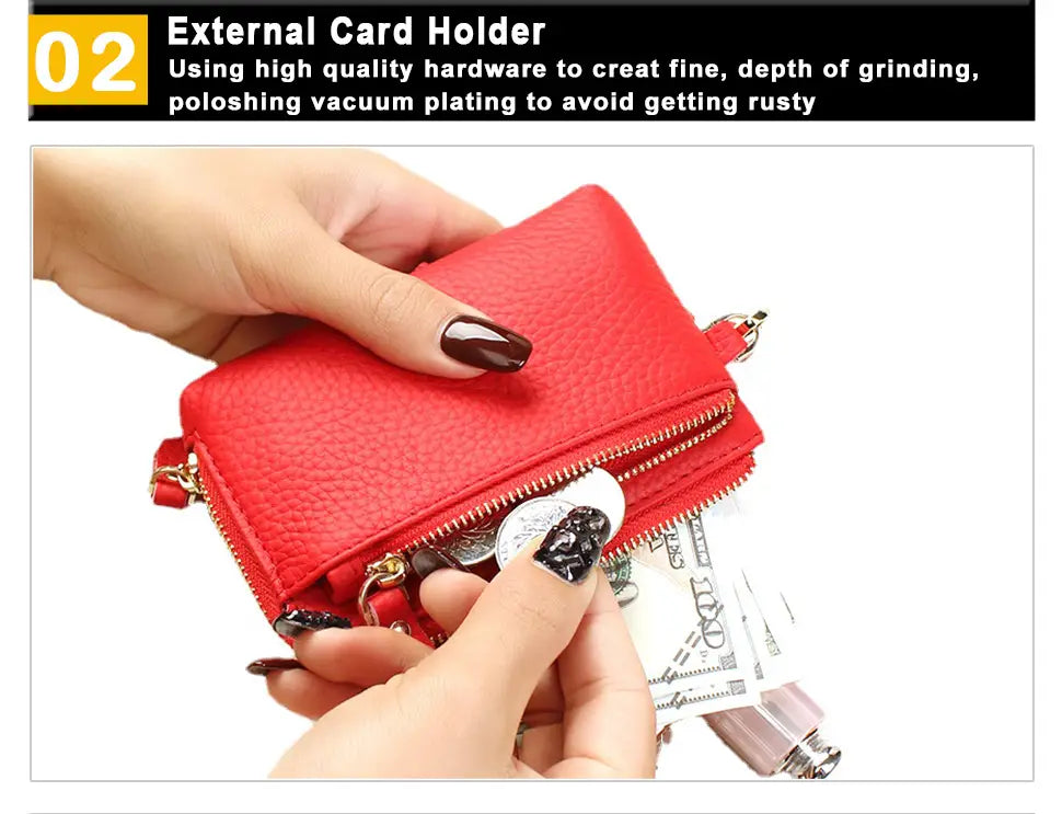 Premium textured leather wristlet wallet with red textured leather external card holder featuring gold zippers and metal hardware.