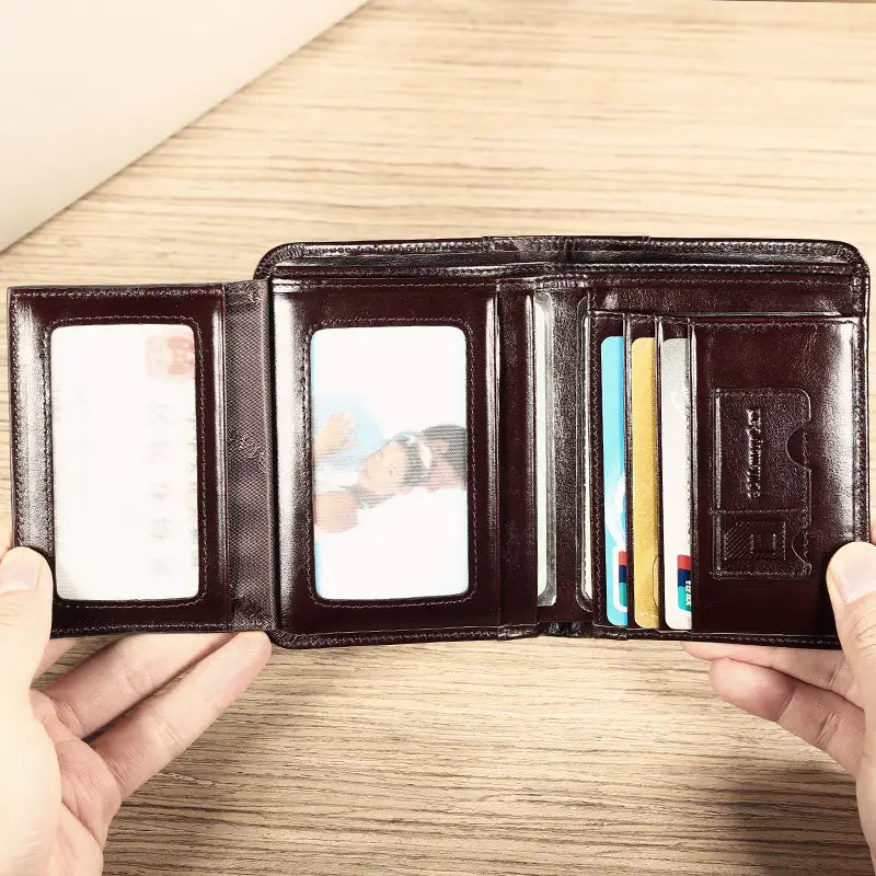 men’s brown leather wallet featuring a tri-fold design with card slots and id windows