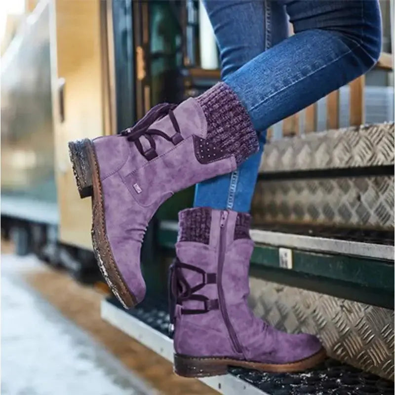 Purple suede women winter snow boots with knitted cuffs and black laces designed as mid calf martin shoes.