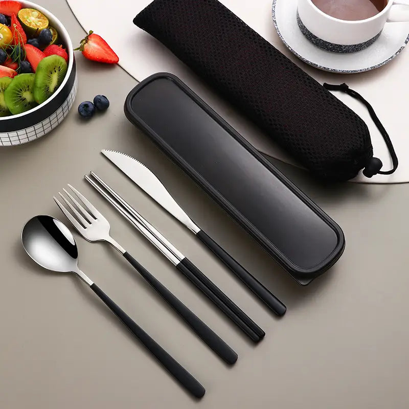 Black-handled stainless steel portable cutlery set with a matching black carrying case for easy transport.