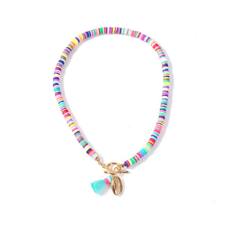 A colorful bohemian rainbow beaded choker featuring a gold-tone toggle clasp and a small turquoise tassel charm.