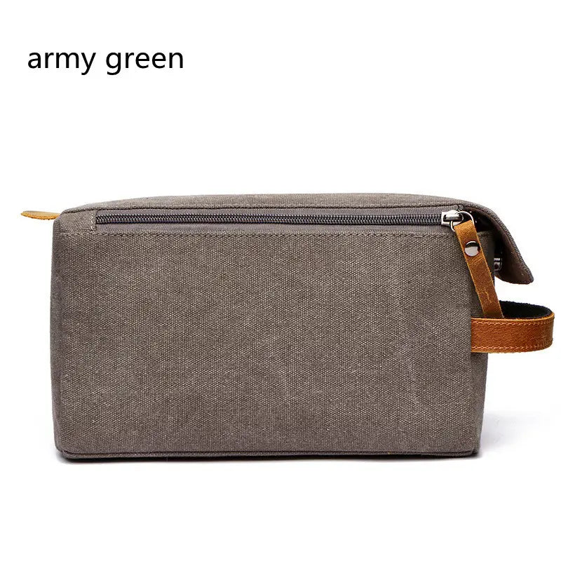 Army green canvas toiletry bag with tan leather pull tab and zipper designed as a large portable travel storage case.