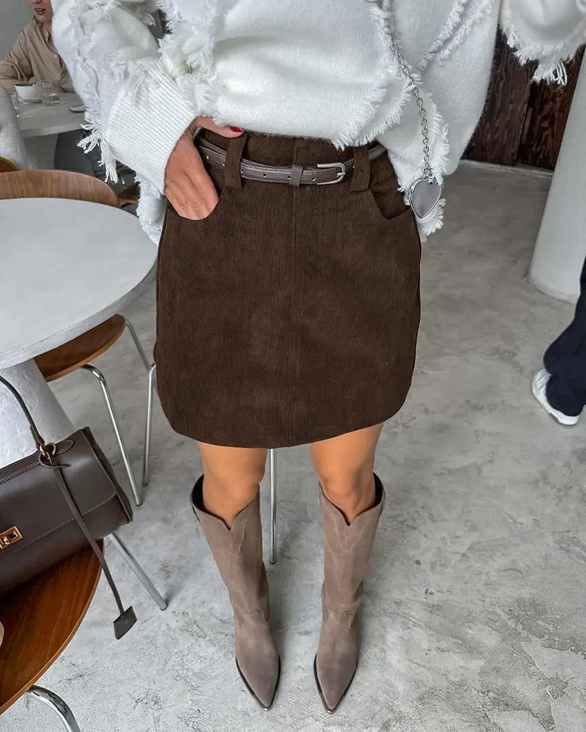 Brown suede retro corduroy mini skirt with a matching belt displayed from the front.