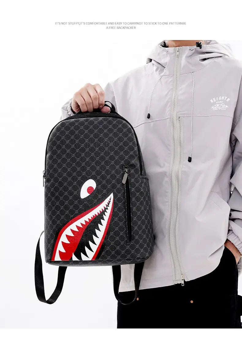 black backpack with bold red and white shark mouth design and repeating geometric pattern made of pu material suitable for business use with large capacity