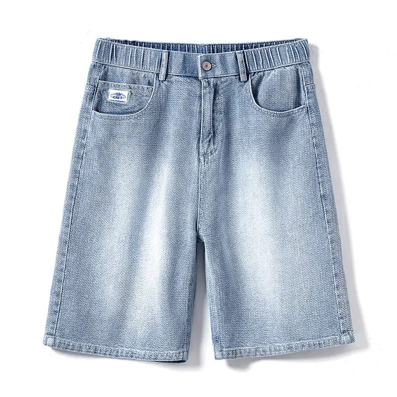 Men’s elastic waist light wash denim shorts with a relaxed fit and elastic waistband.