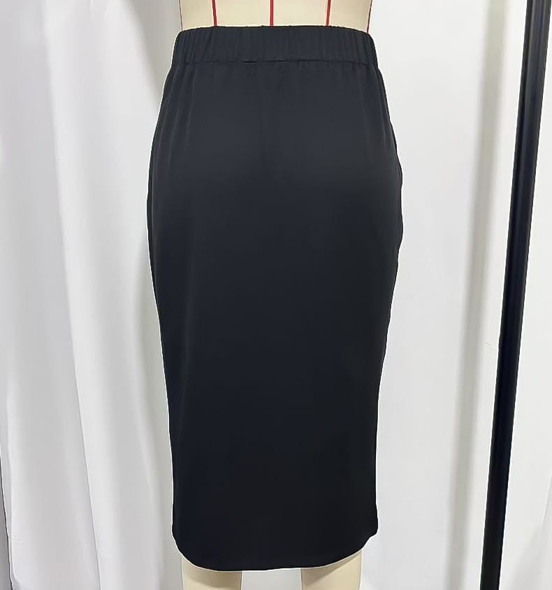 High waisted black satin pencil skirt with a smooth sleek finish elastic waistband and silver buckle.