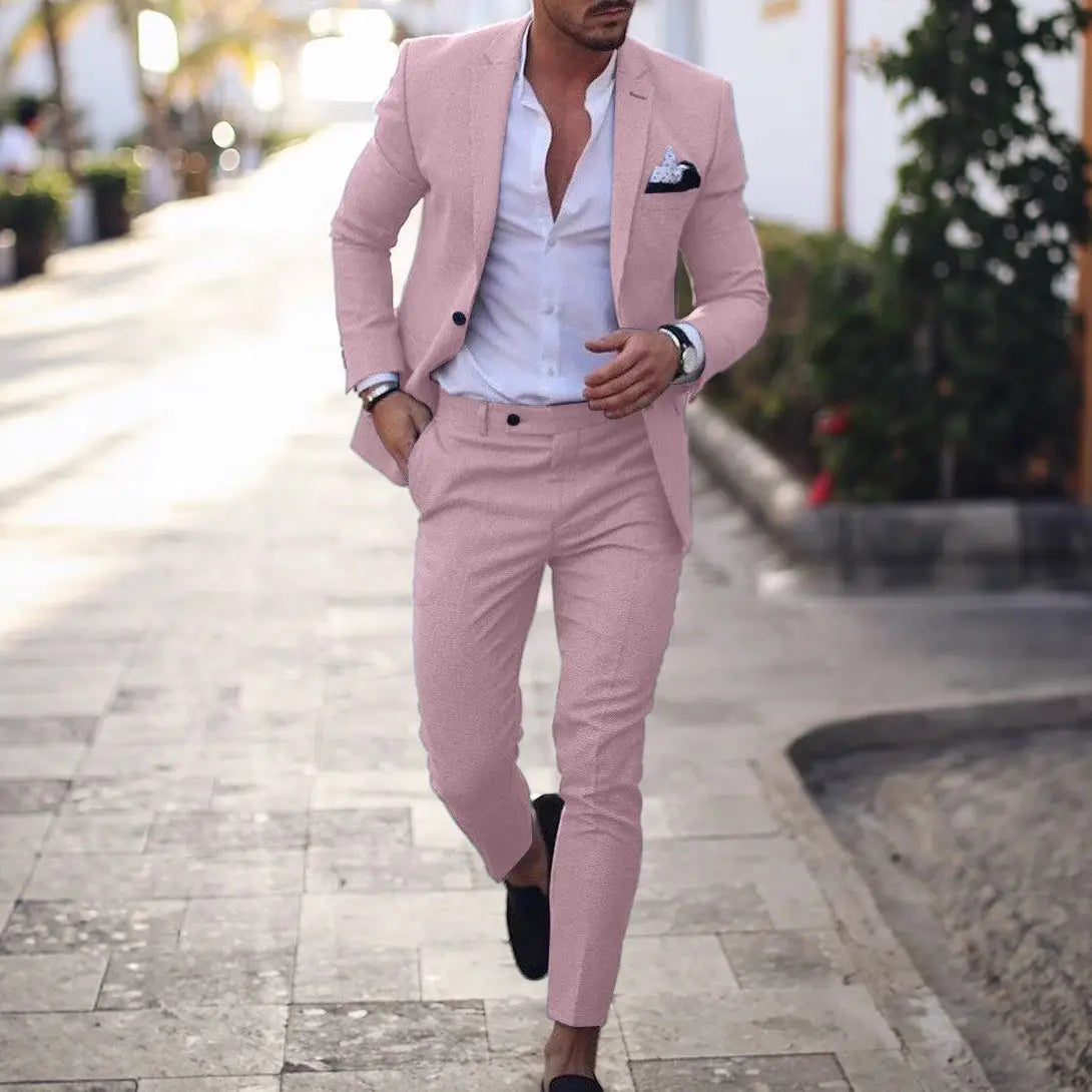 A stylish pink men digital print casual suit set featuring a subtle textured pattern with matching trousers and blazer.