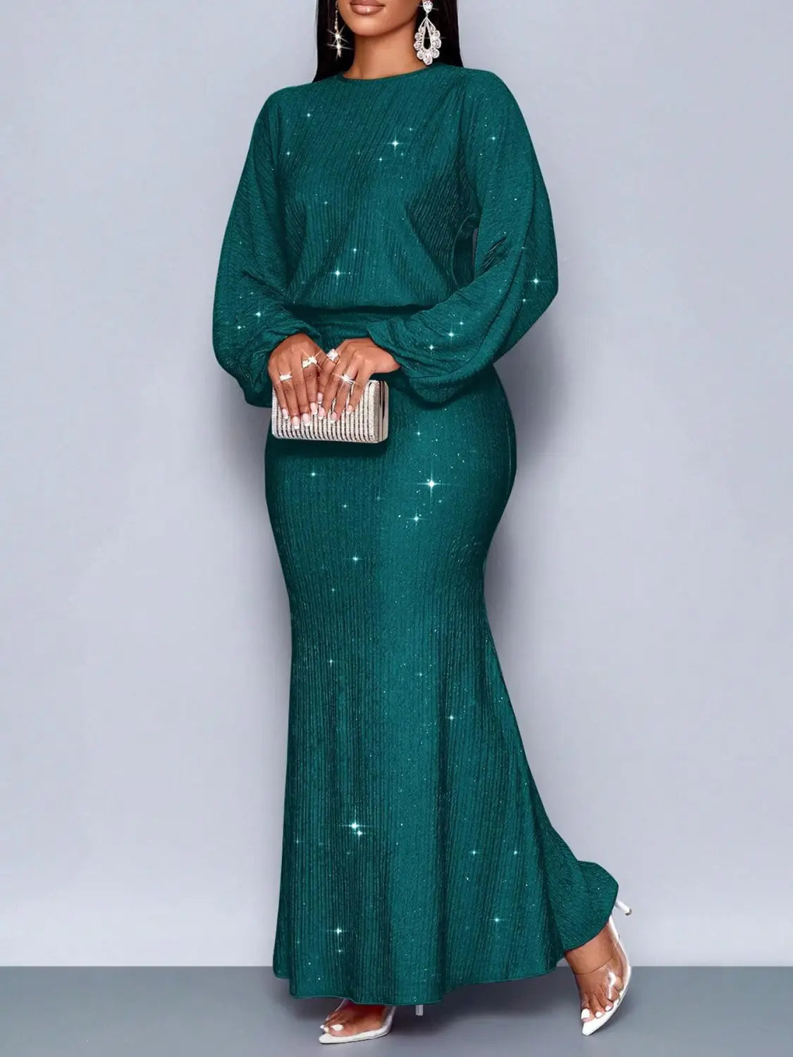 emerald green mermaid-style gown with long sequin lantern sleeves and sparkling star-like embellishments in a two piece set