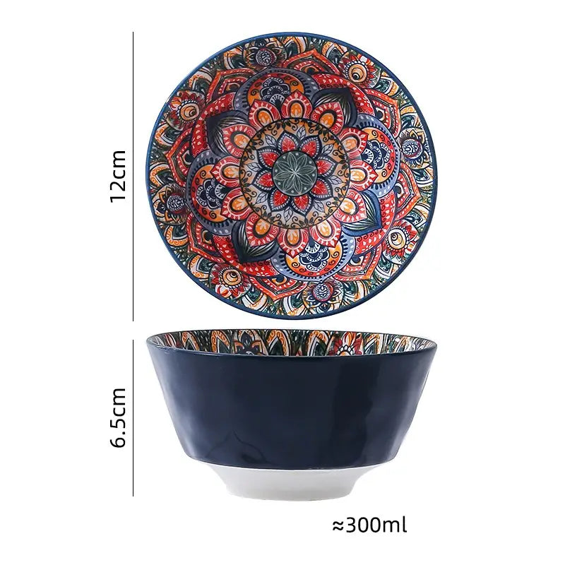 A vibrant hand-painted ceramic mandala serving bowl with a deep navy exterior and intricate red orange blue and gold design on the interior holding 400ml.