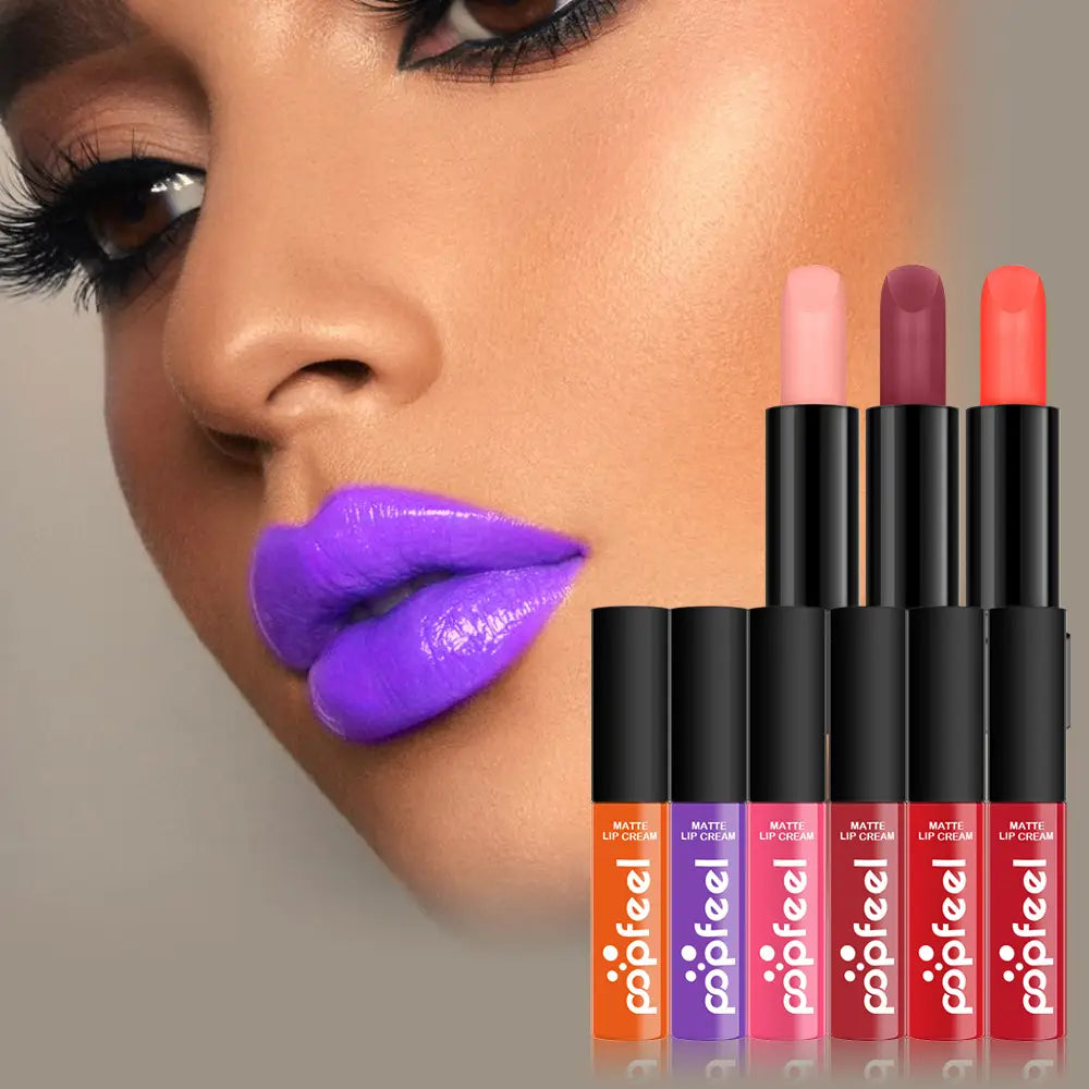 A set of five matte lip cream sticks in vibrant orange purple pink and red housed in sleek black cylindrical tubes with the brand name popeel on an orange label part of the Makeup Set Popfeel Festive Red Gift Kit 27 Pcs.