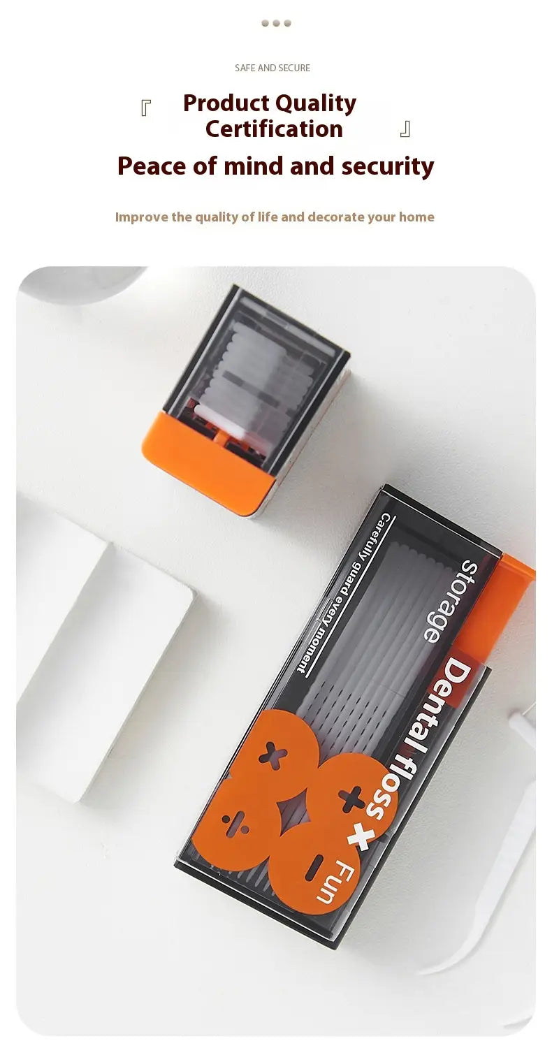 Caja portátil para hilo dental con dispensador automático de apertura emergente en negro y naranja, con ventana transparente y diseños lúdicos de símbolos matemáticos