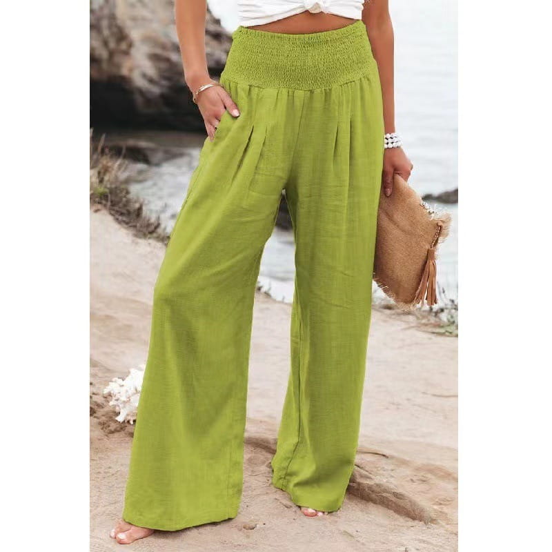 smocked wide leg pants for women in lime green featuring a high waist and smocked elastic waistband perfect for casual or formal wear.