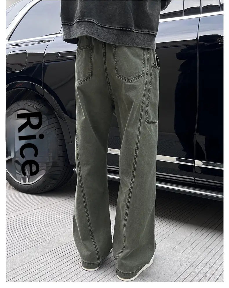 olive green wide-leg cotton cargo pants for men featuring visible stitching and multiple pockets suitable for workwear.
