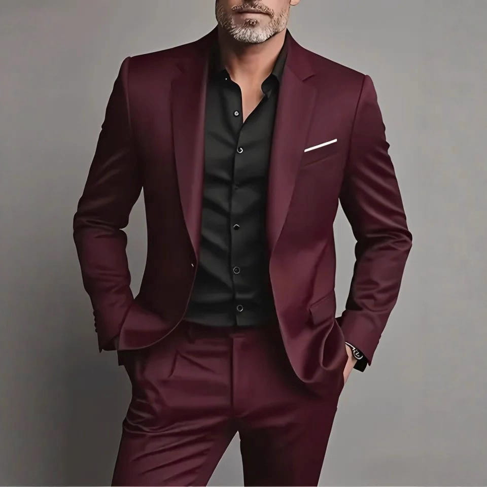 A sleek maroon mens slim fit three piece suit set with a tailored fit and subtle sheen.