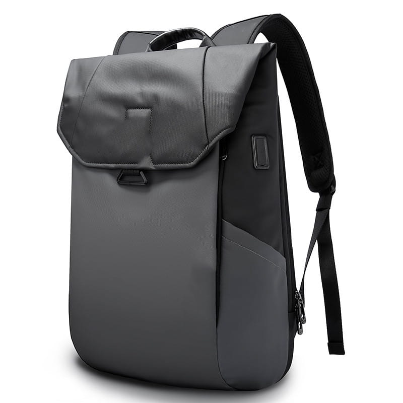 Dark gray laptop backpack with sleek modern design black shoulder straps and usb charging port minimalist school bag.