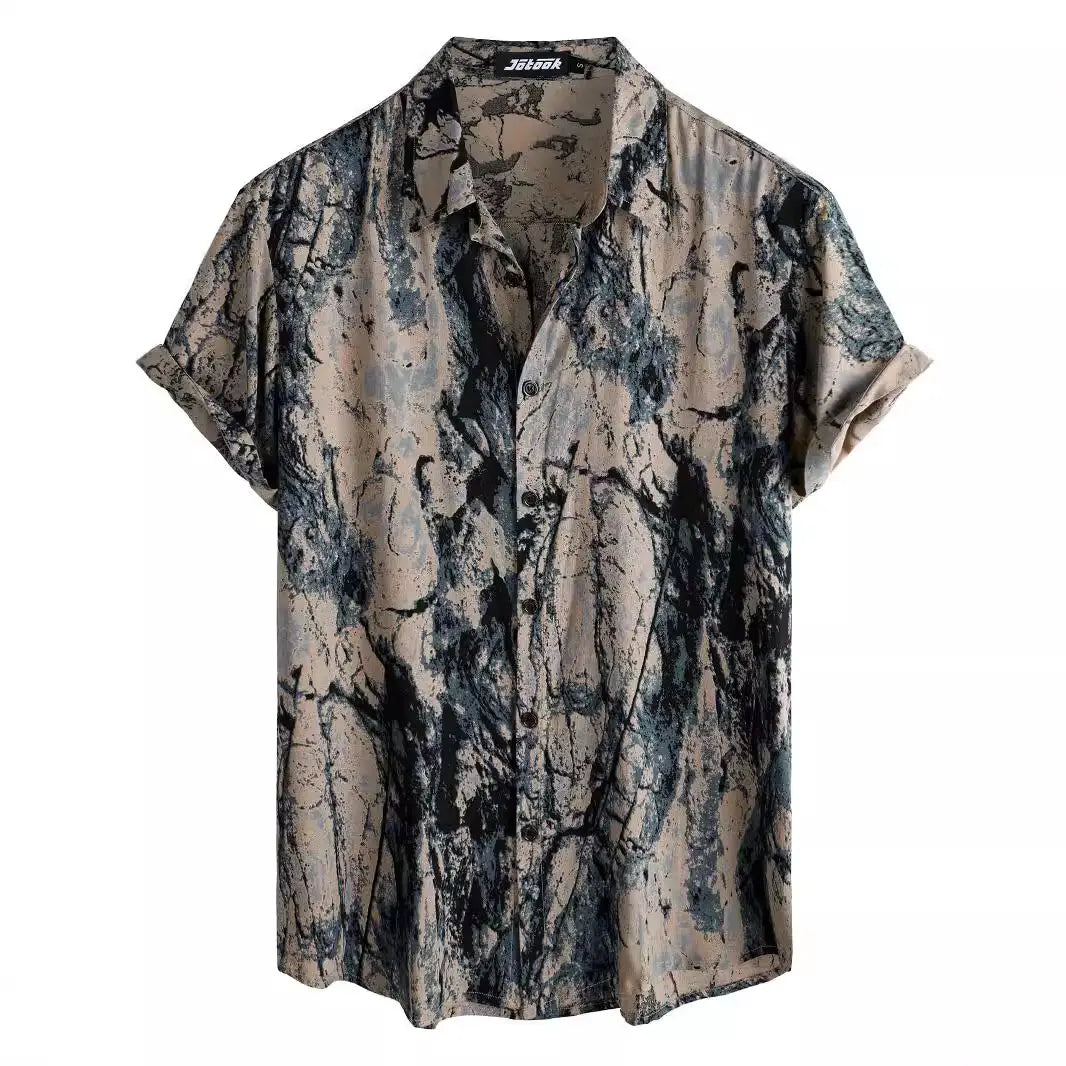 Floral Hawaiian short sleeve shirt for men featuring a beige and dark blue abstract marble print with short sleeves, rolled cuffs, and a collar.