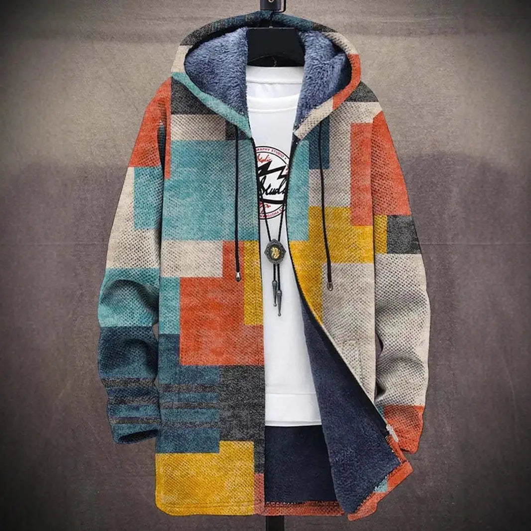 A cozy multicolored patchwork geometric fleece men’s jacket with a plush blue-lined hood and drawstrings.