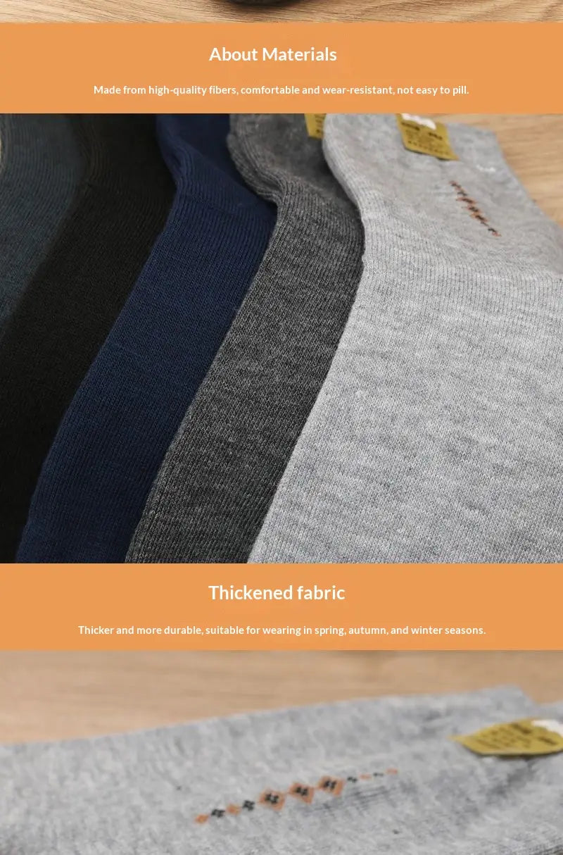 Men mid calf crew socks five pack in gray heathered fabric featuring a subtle embroidered pattern and reinforced thickened material for durability.