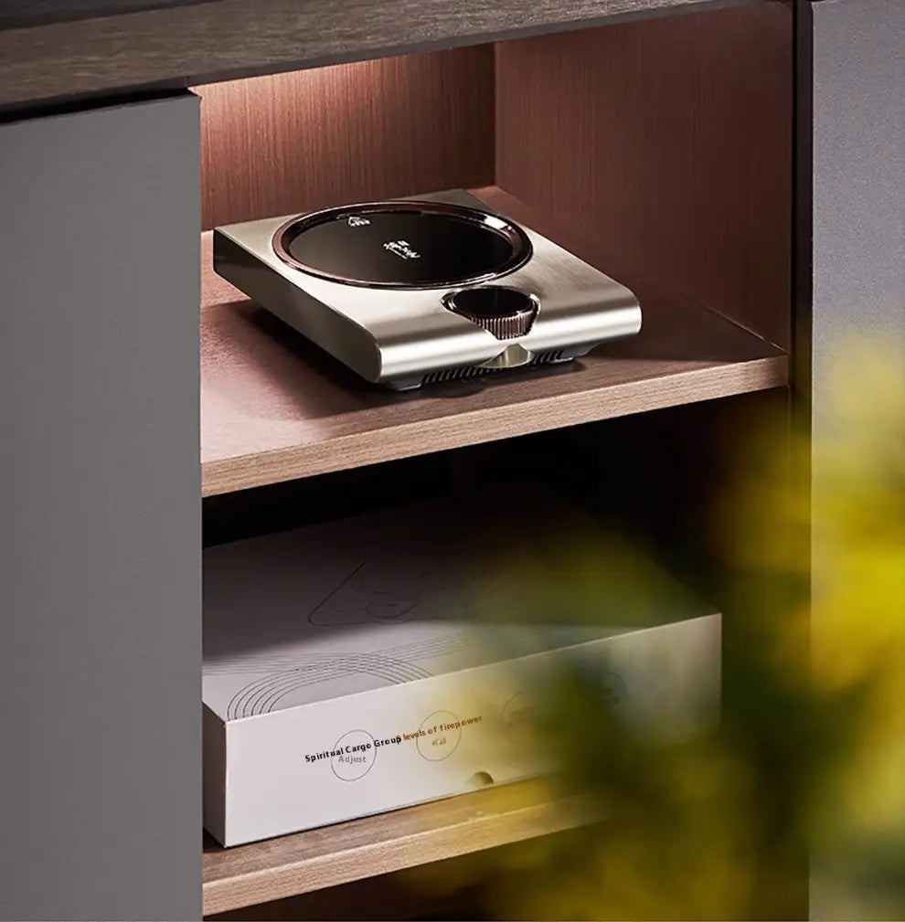 Silver and black induction cooktop with a sleek modern design for electric ceramic stove 1000w tea cooker kettle use
