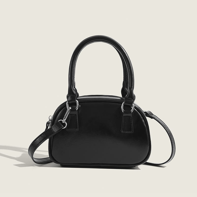 Black glossy faux leather handbag with curved top handles and detachable shoulder strap retro glossy pu leather small square handbag 20cm